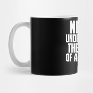 never uderestimate the power of a girl with a book Mug